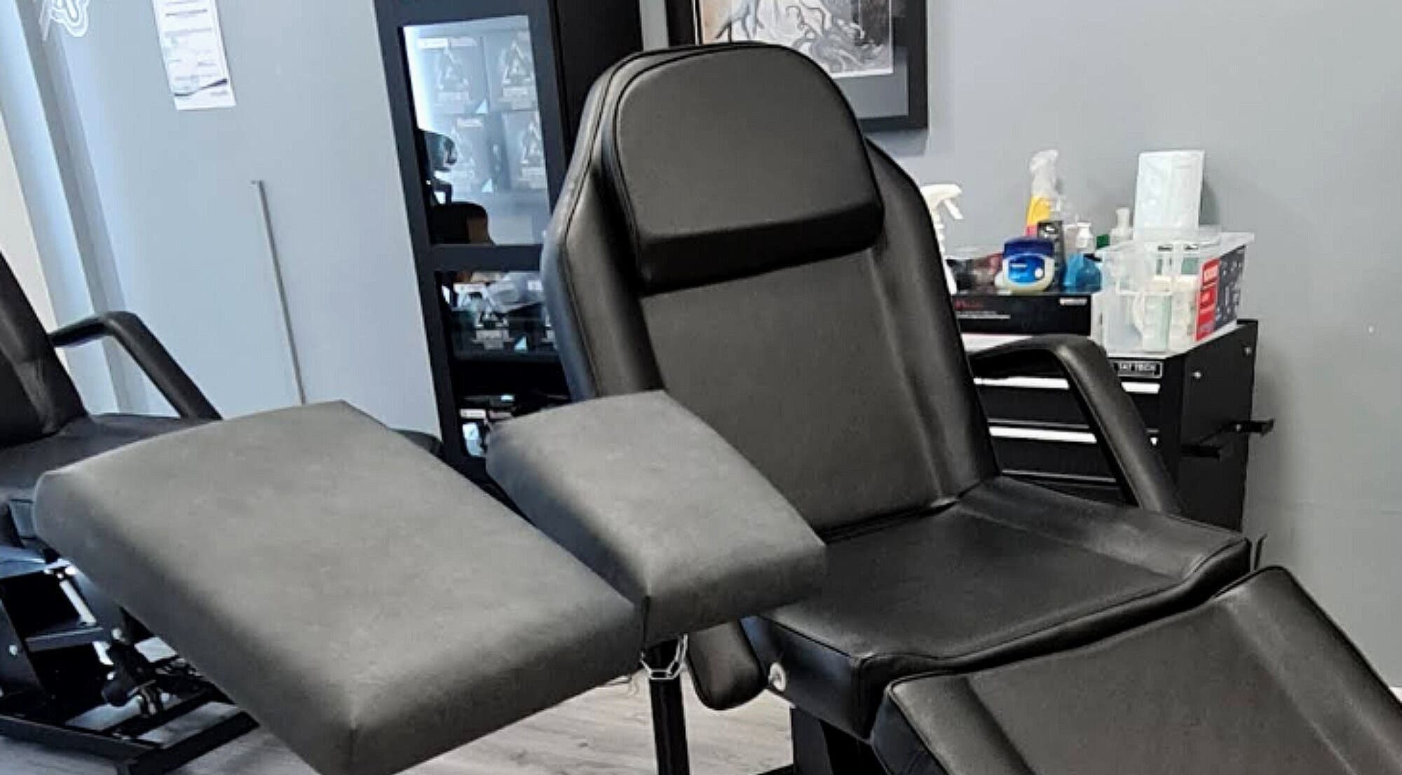 Comfortable barber chair at House Of Luxxe Barbers Ltd, Yate, England, GB, showcasing modern styling.