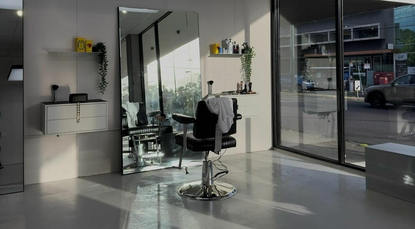 Chic interior of Studio Zero Essendon, Melbourne, Victoria, AU with styling chair and large windows.