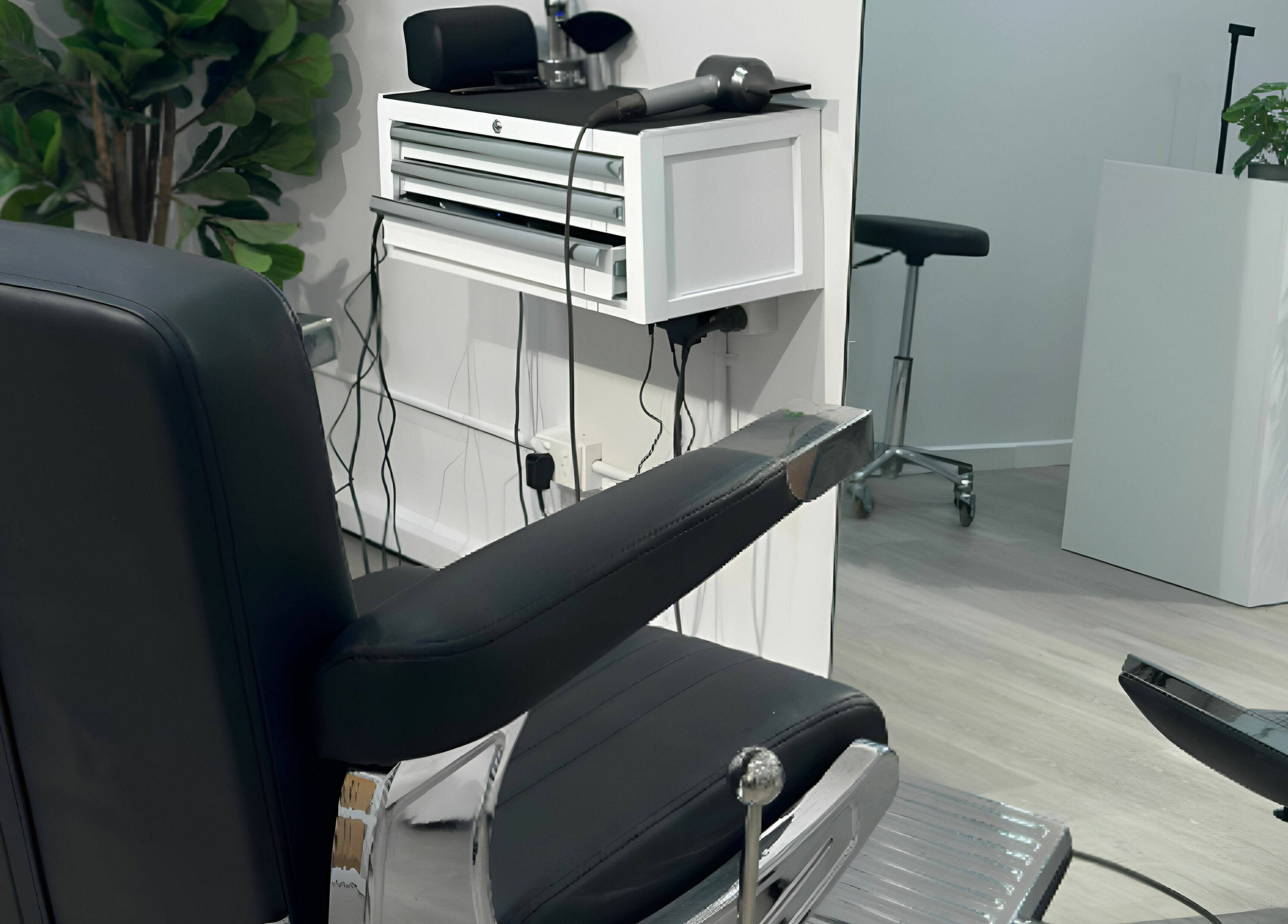 Stylish salon chair and modern furnishings at Studio Zero Essendon, Melbourne, Victoria, AU.