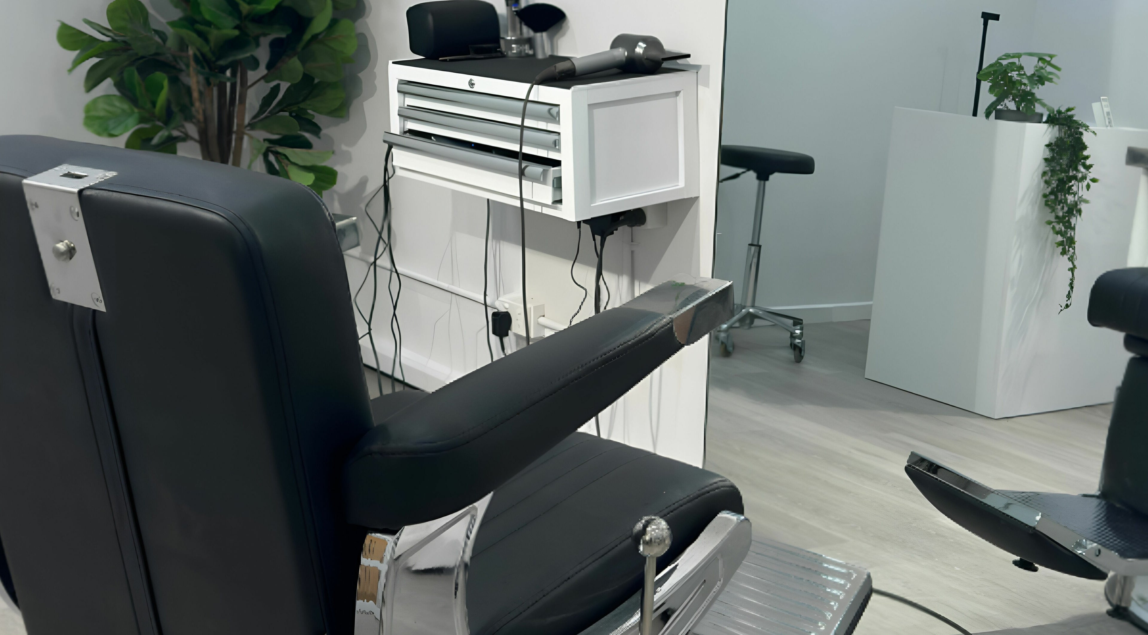 Stylish salon chair and modern furnishings at Studio Zero Essendon, Melbourne, Victoria, AU.