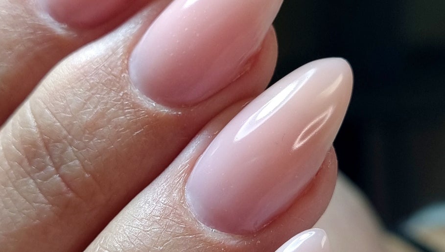 Beautiful manicured nails at The Luxe Beauty in Stellenbosch, Western Cape, ZA, showcasing expert nail care.