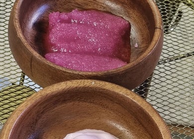 Natural skincare elixirs in wooden bowls at The Luxe Beauty, Stellenbosch, Western Cape, ZA.