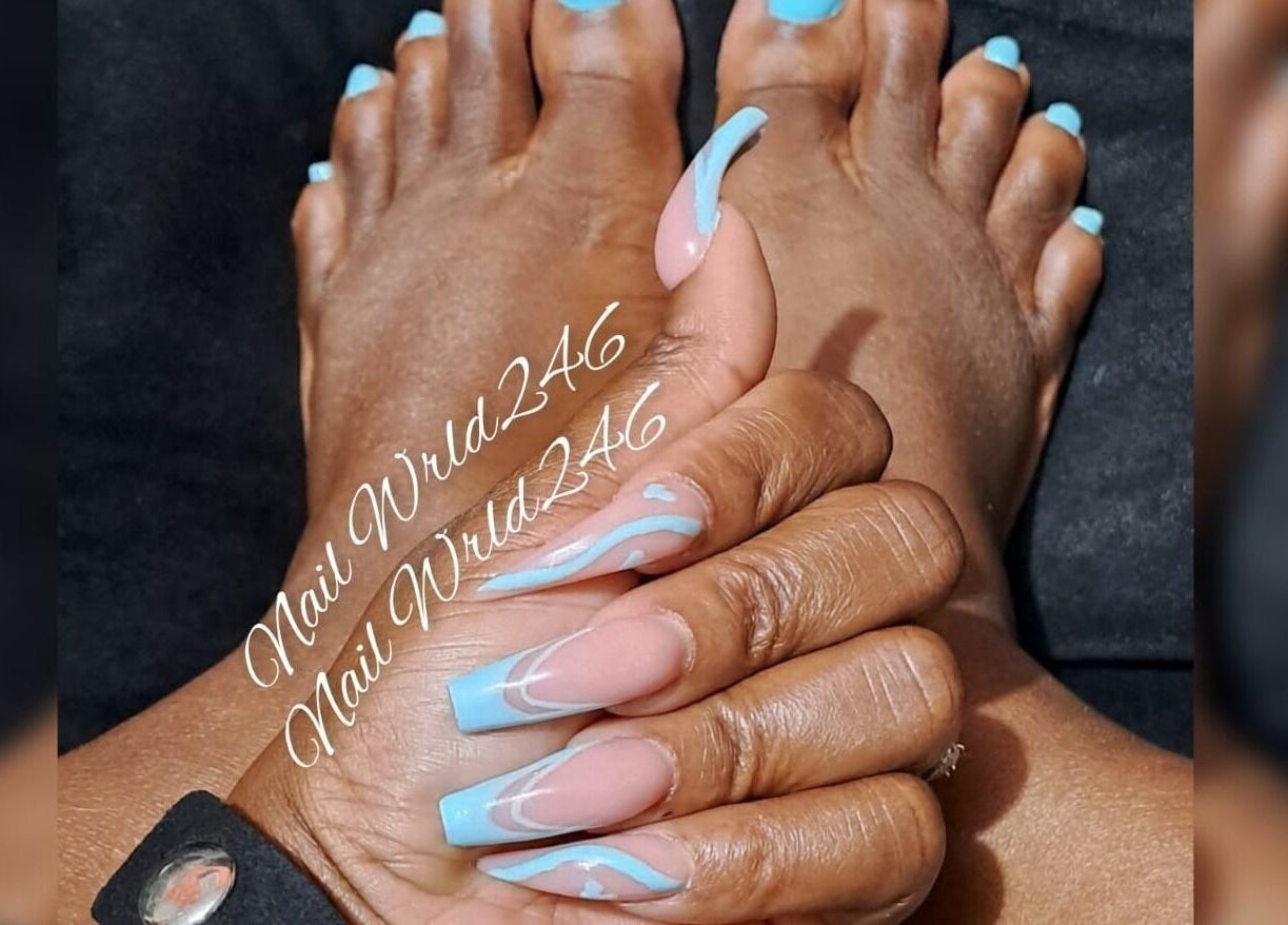 Elegant blue nails and pedicure at Nailwrld246 in Saint James, Saint James, BB.