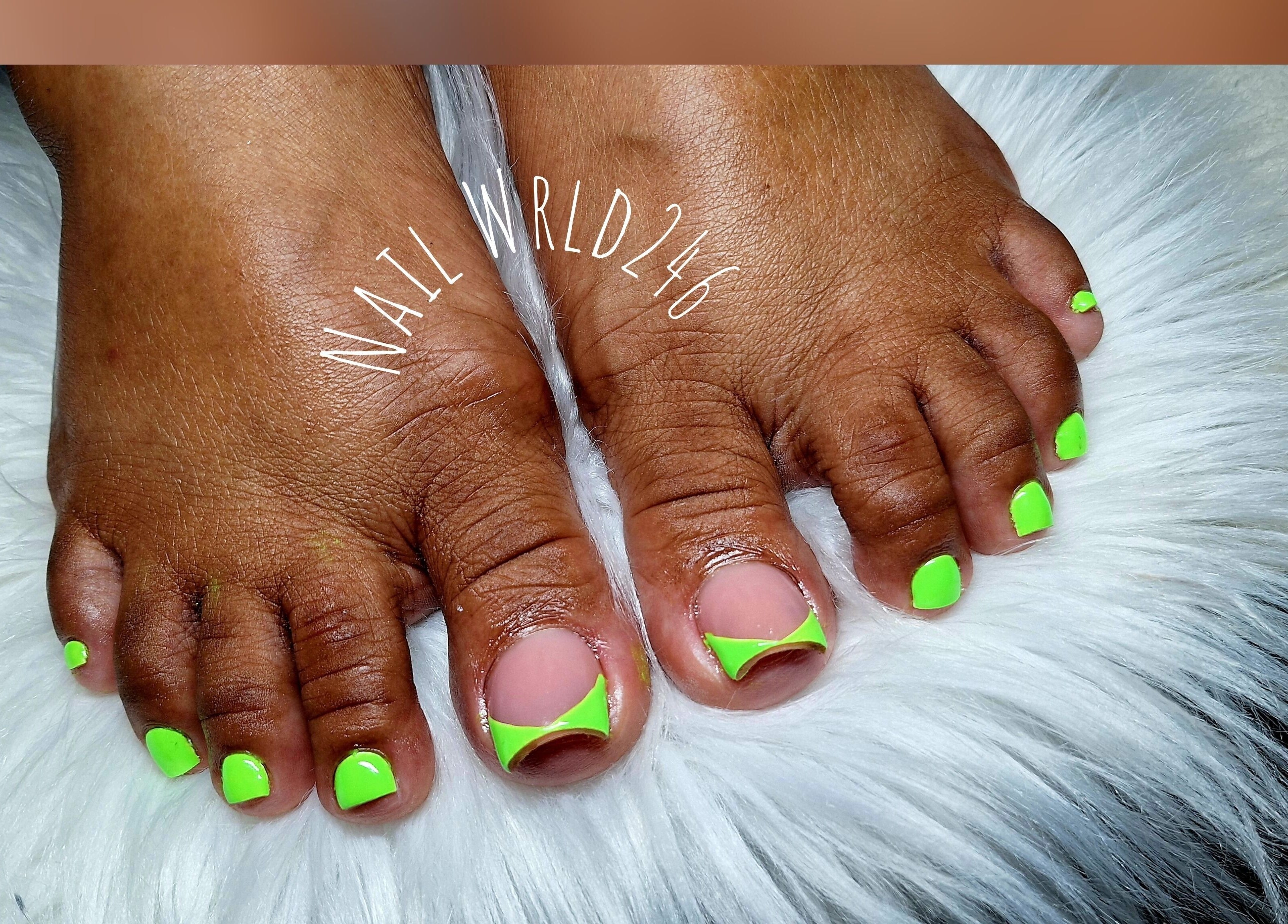 Bright neon green pedicure at Nailwrld246, Saint James, Saint James, BB.