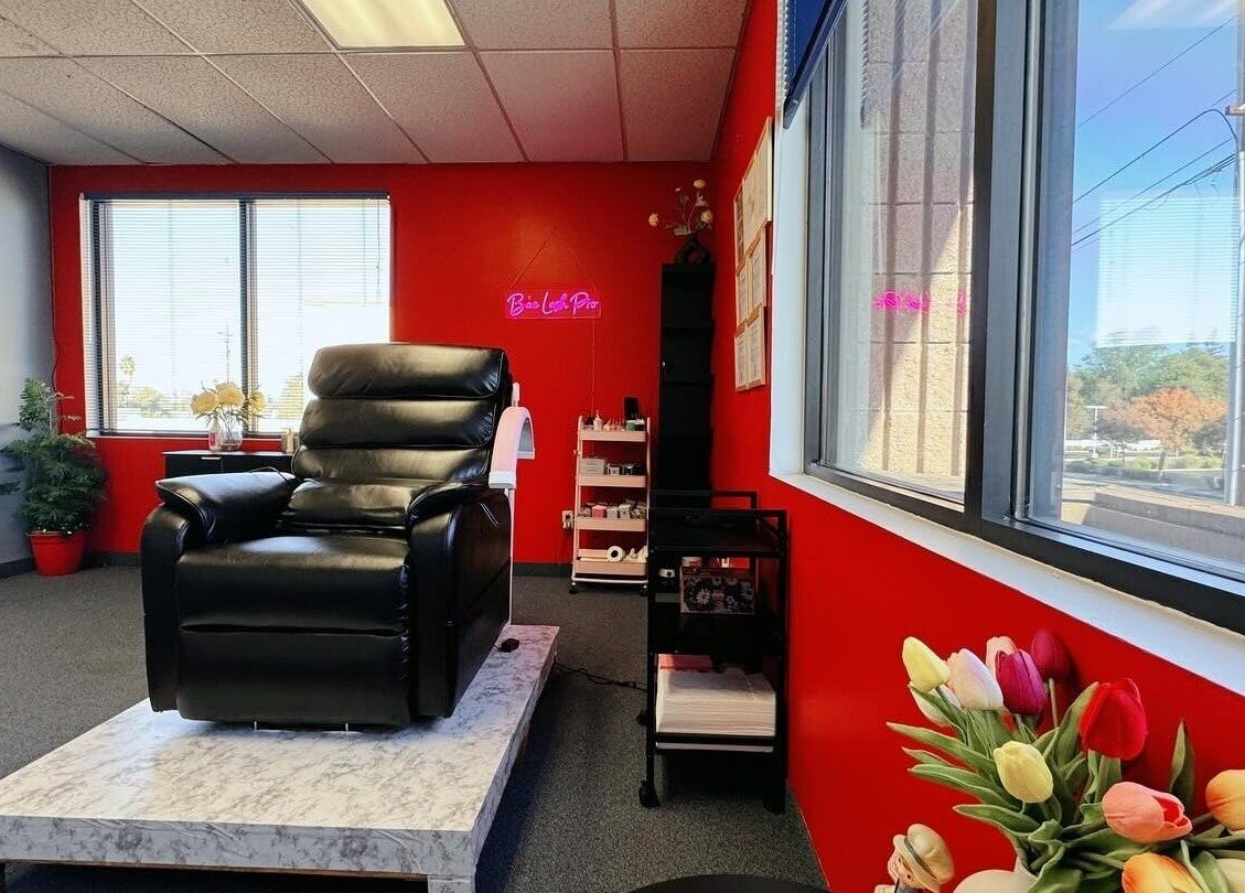 Luxurious beauty lounge at Bae Lash Pro, San Jose, California, US with black chair and vibrant decor.