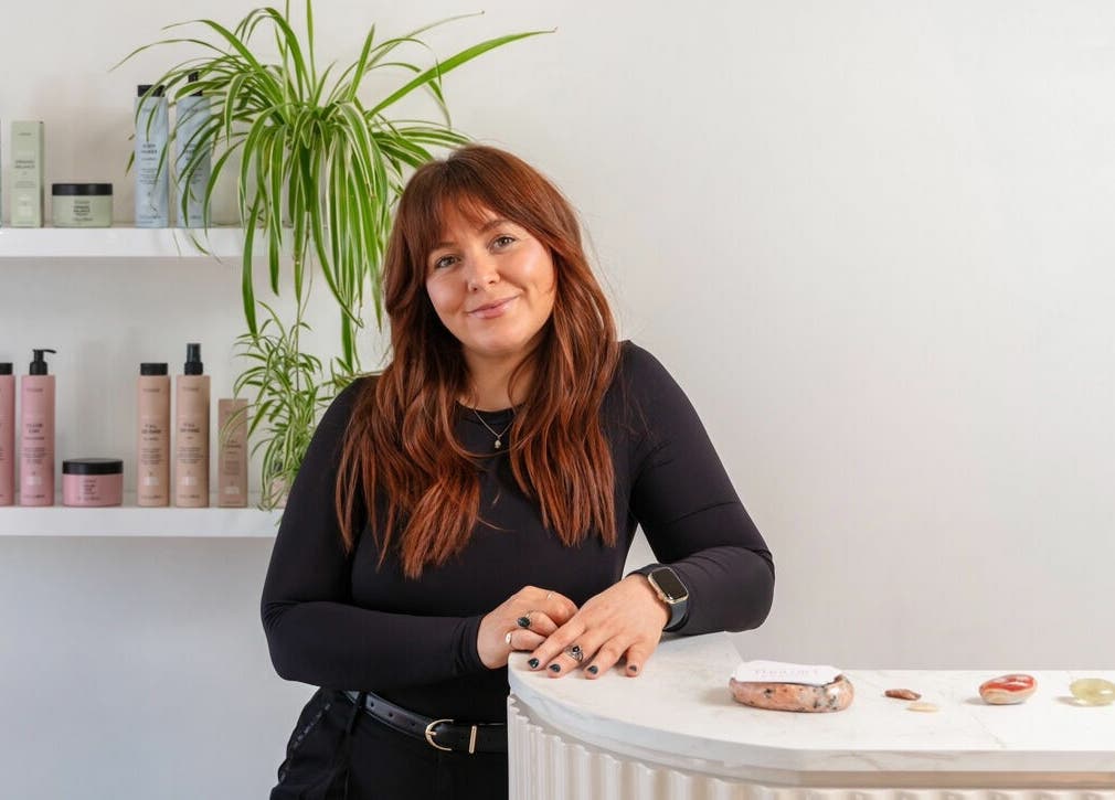 Friendly staff at That Girl Studio in St Kilda, Melbourne, with beauty products displayed.