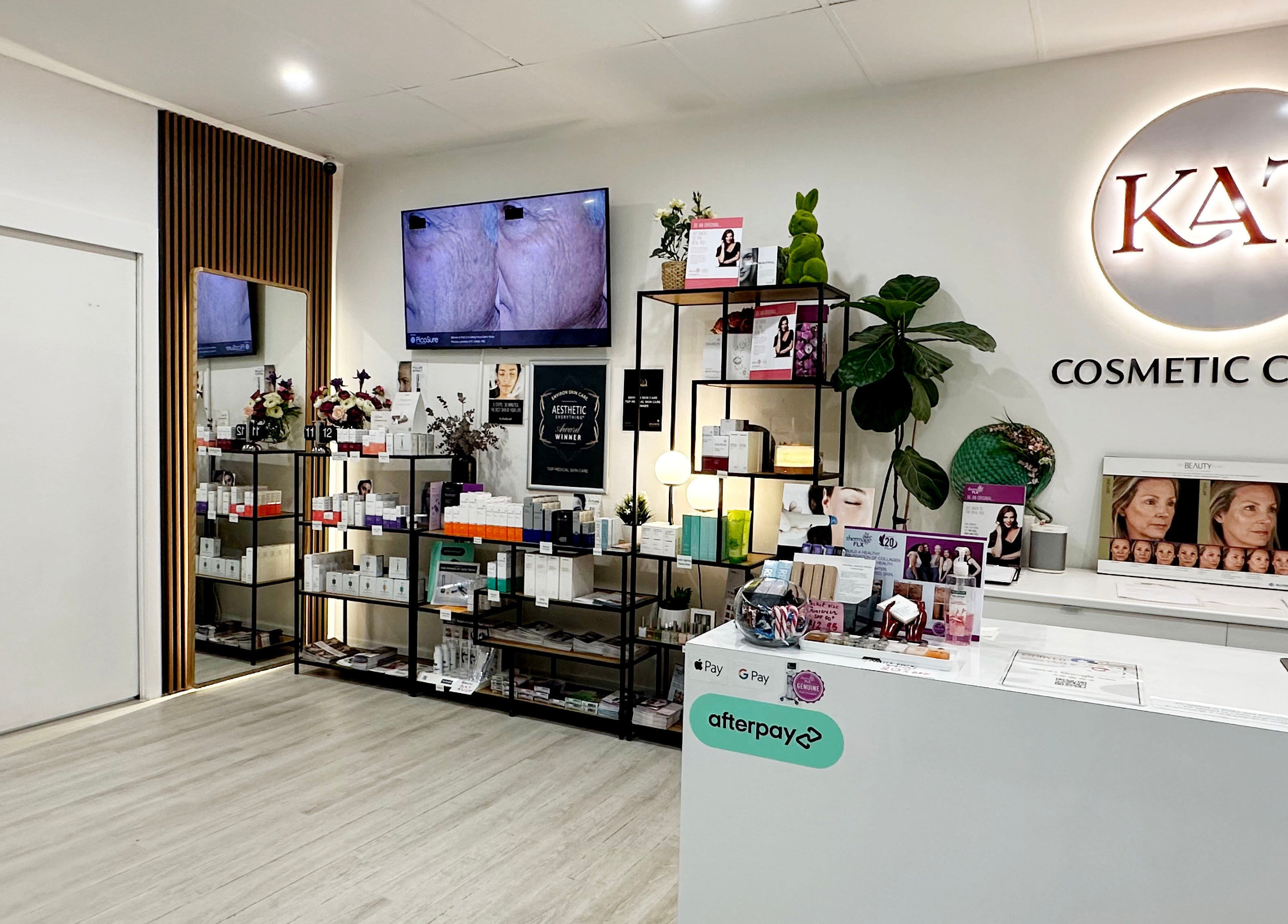 Interior of KAT Cosmetic Clinic, Cabramatta, New South Wales, AU, showcasing skincare products on display.