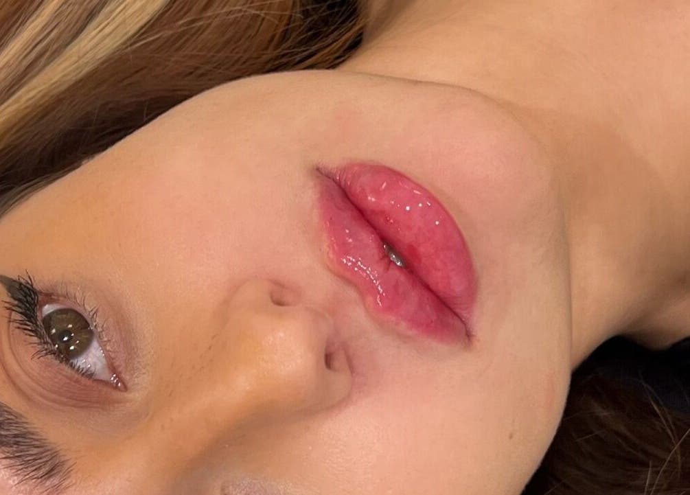 Close-up of glossy lips and eye makeup at Aesthetic Atelier, Crawley, England, GB.