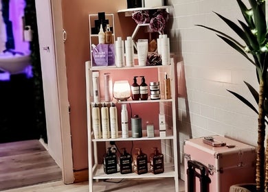 Stylish product shelf at Hue of Aura in Timaru, Canterbury, NZ, showcasing premium beauty and wellness items.