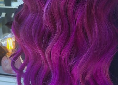 Vibrant purple hair flowing elegantly at Hue of Aura, Timaru, Canterbury, NZ.