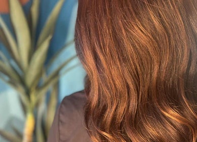 Beautiful, shiny brown hair at Hue of Aura, Timaru, Canterbury, NZ. Perfect for wellness and beauty enthusiasts.