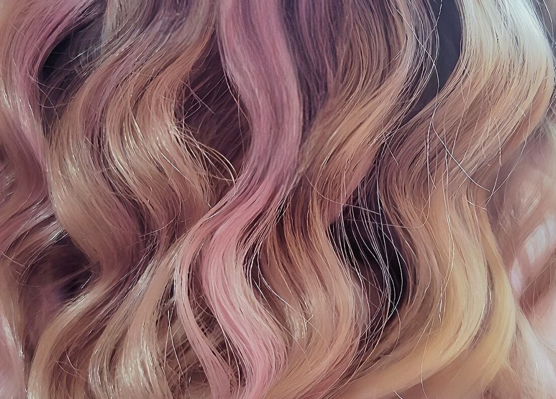 Close-up of wavy, pastel-colored hair at Hue of Aura, Timaru, Canterbury, NZ.