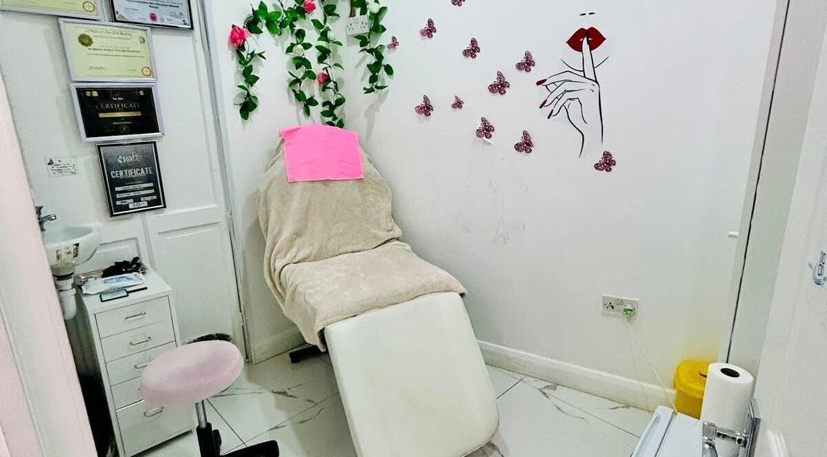 Relaxing treatment room at Beauty Works, London, England, GB with a cozy chair and soothing decor.