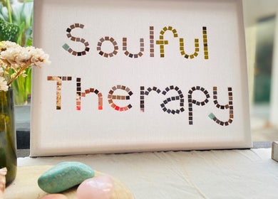 Soulful Therapy sign at relaxing venue in Amsterdam, Noord-Holland, NL with calming natural decor.