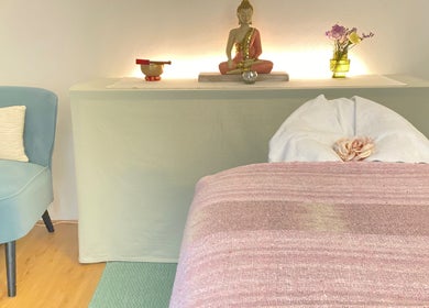 Tranquil therapy space at Soulful Therapy, Amsterdam, Noord-Holland, NL with a calming decor and massage bed.