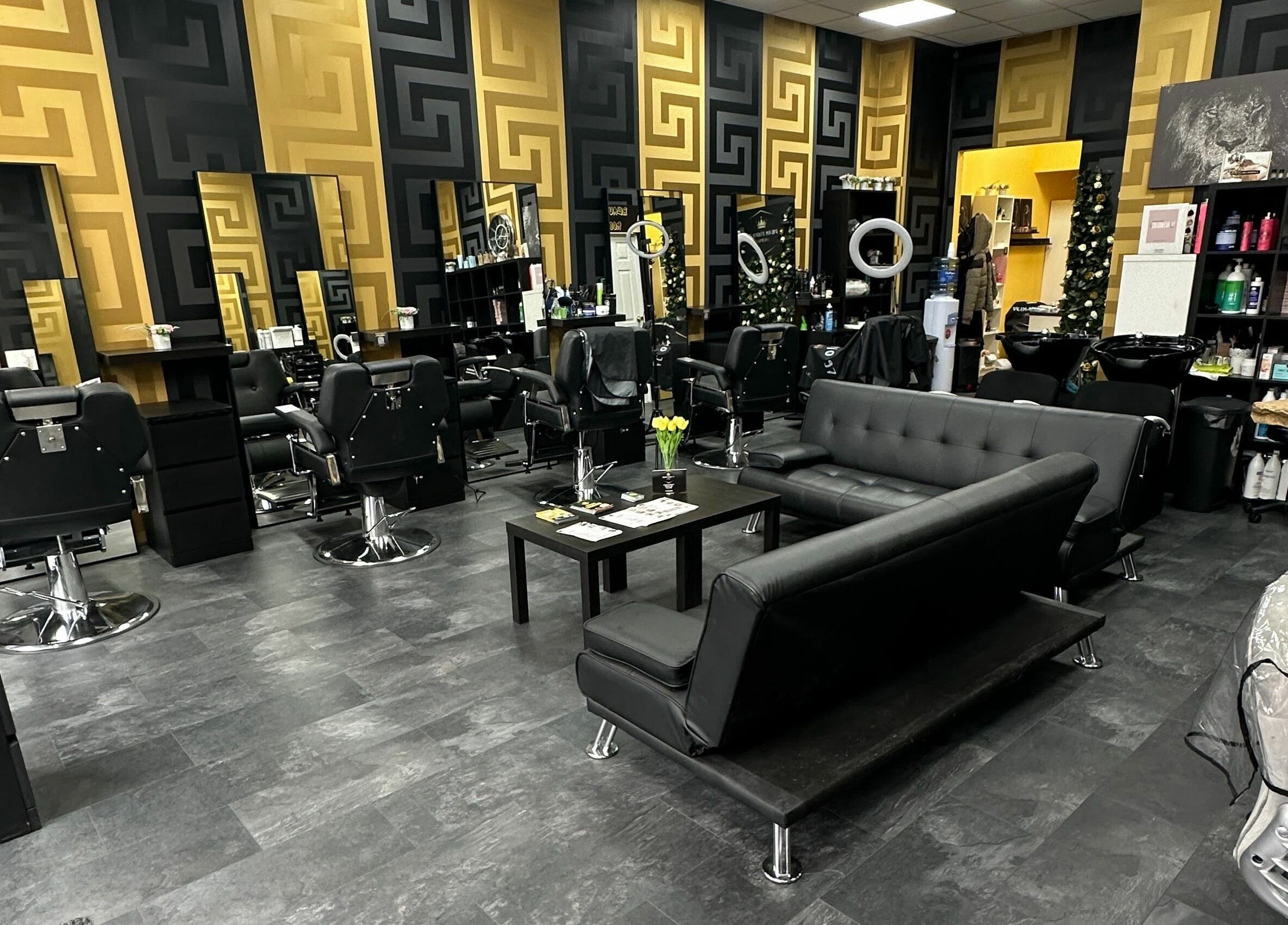 Elegant interior of Dream Studio 97 - Hounslow, showcasing sleek black seating and ornate decor, Hounslow, England, GB.