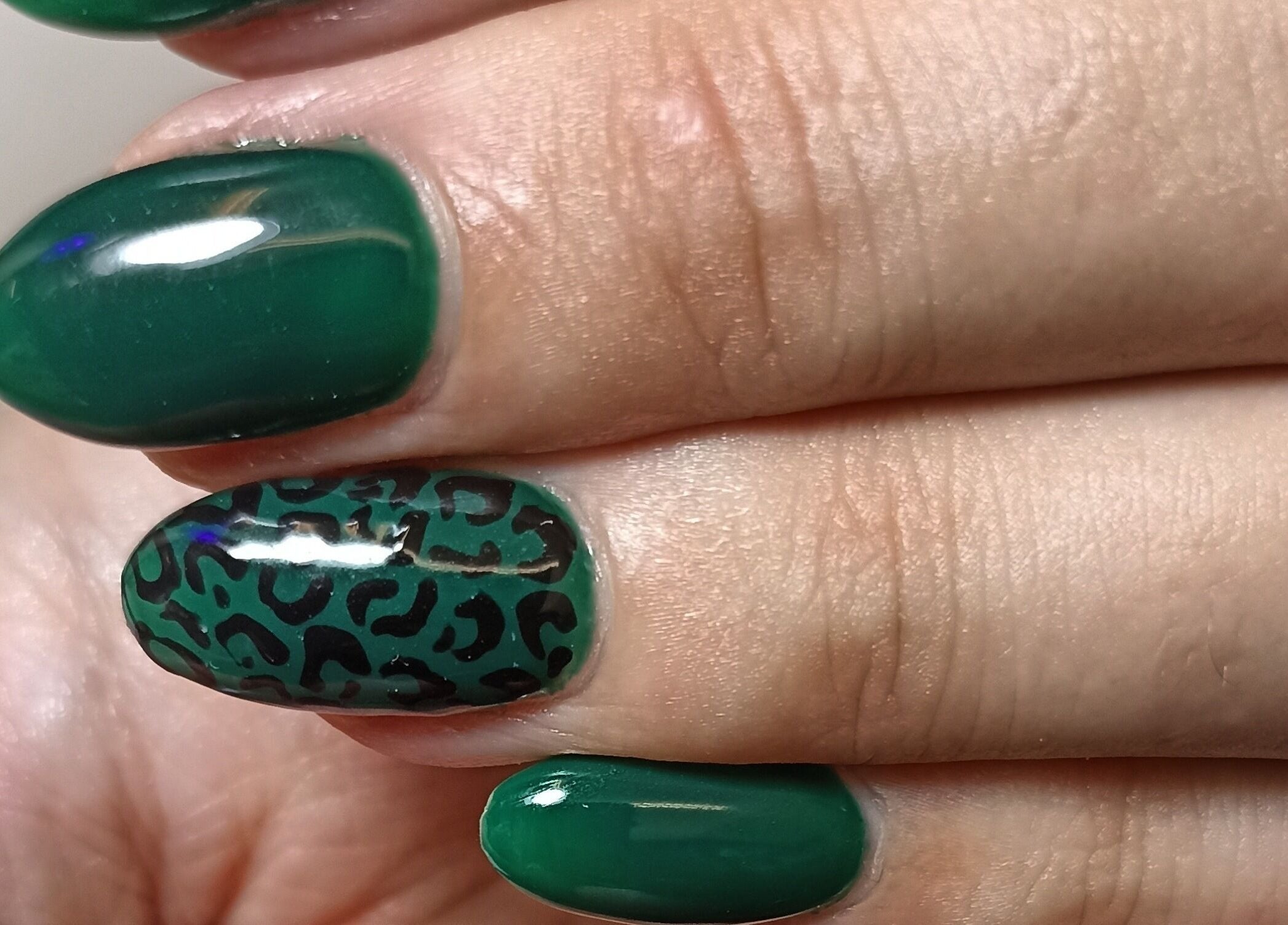 Stylish green leopard print nails at Tranquility C Salon, Krugersdorp, Gauteng, ZA.
