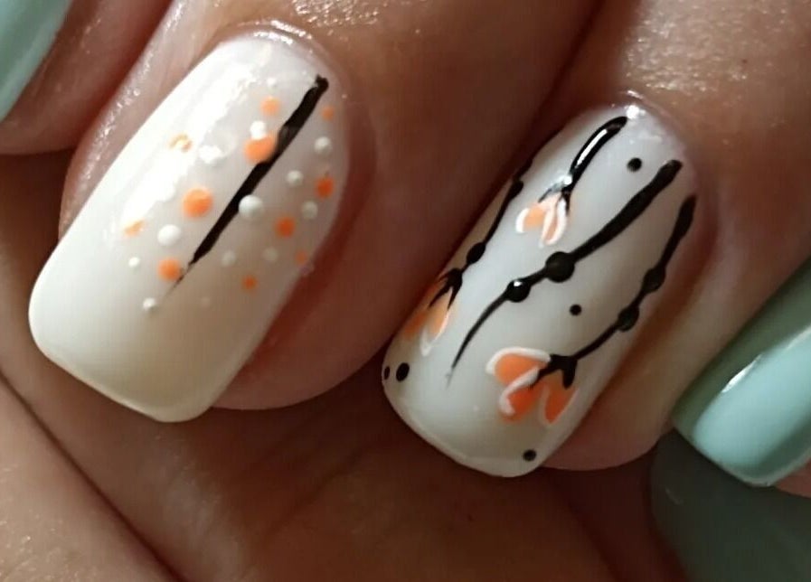 Elegant floral nail art at Tranquility C Salon, Krugersdorp, Gauteng, ZA.