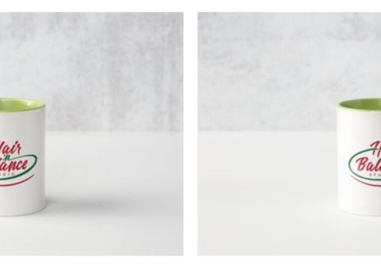 Hair 'n Balance Studio branded mugs on a table, Paramaribo, SR.