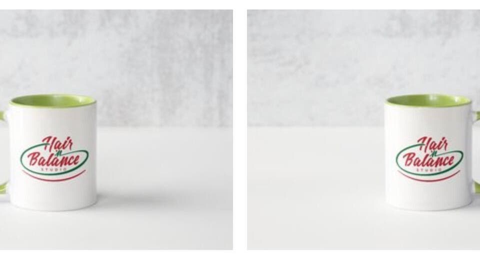 Hair 'n Balance Studio branded mugs on a table, Paramaribo, SR.