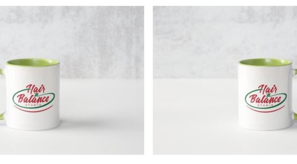 Hair 'n Balance Studio branded mugs on a table, Paramaribo, SR.