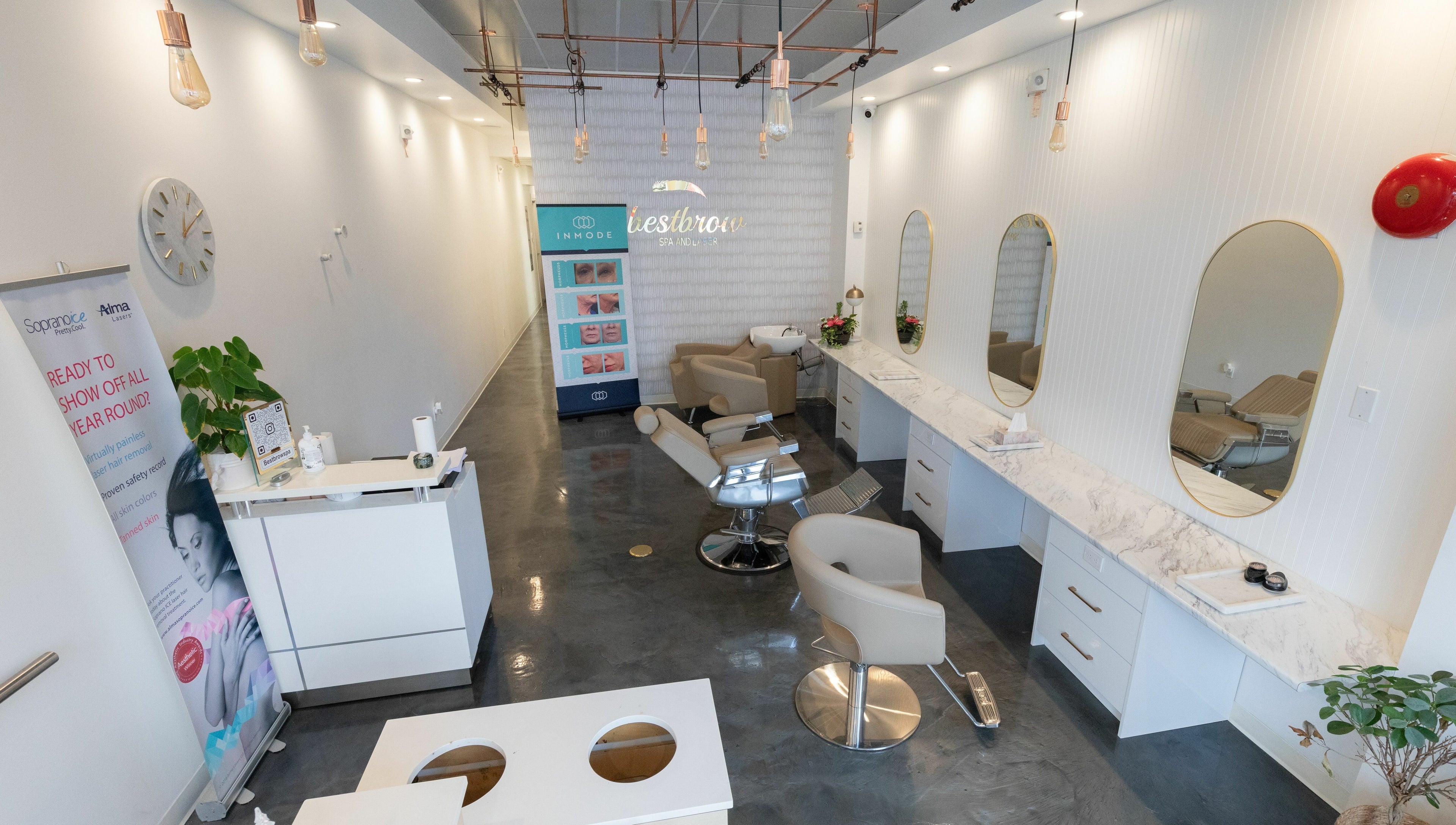 Elegant interior of Best Brow Spa, Vancouver, British Columbia, CA, showcasing chic modern design and styling chairs.