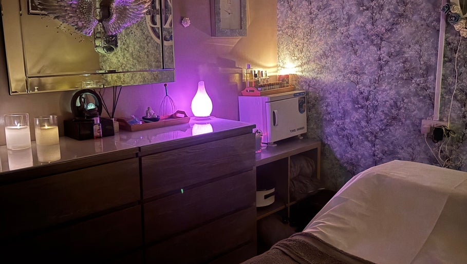 Peaceful treatment room at Krystle Beauty, Swalwell, England, GB with soft lighting and calming decor.