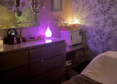 Peaceful treatment room at Krystle Beauty, Swalwell, England, GB with soft lighting and calming decor.