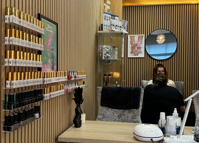 Krystle Beauty nail studio in Swalwell, England, GB, showcasing a stylish interior with polish display.