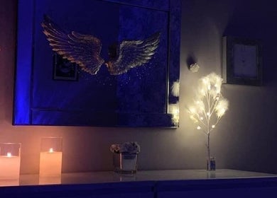 Warmly lit candles and delicate lights create a calming ambiance at Krystle Beauty, Swalwell, England, GB.