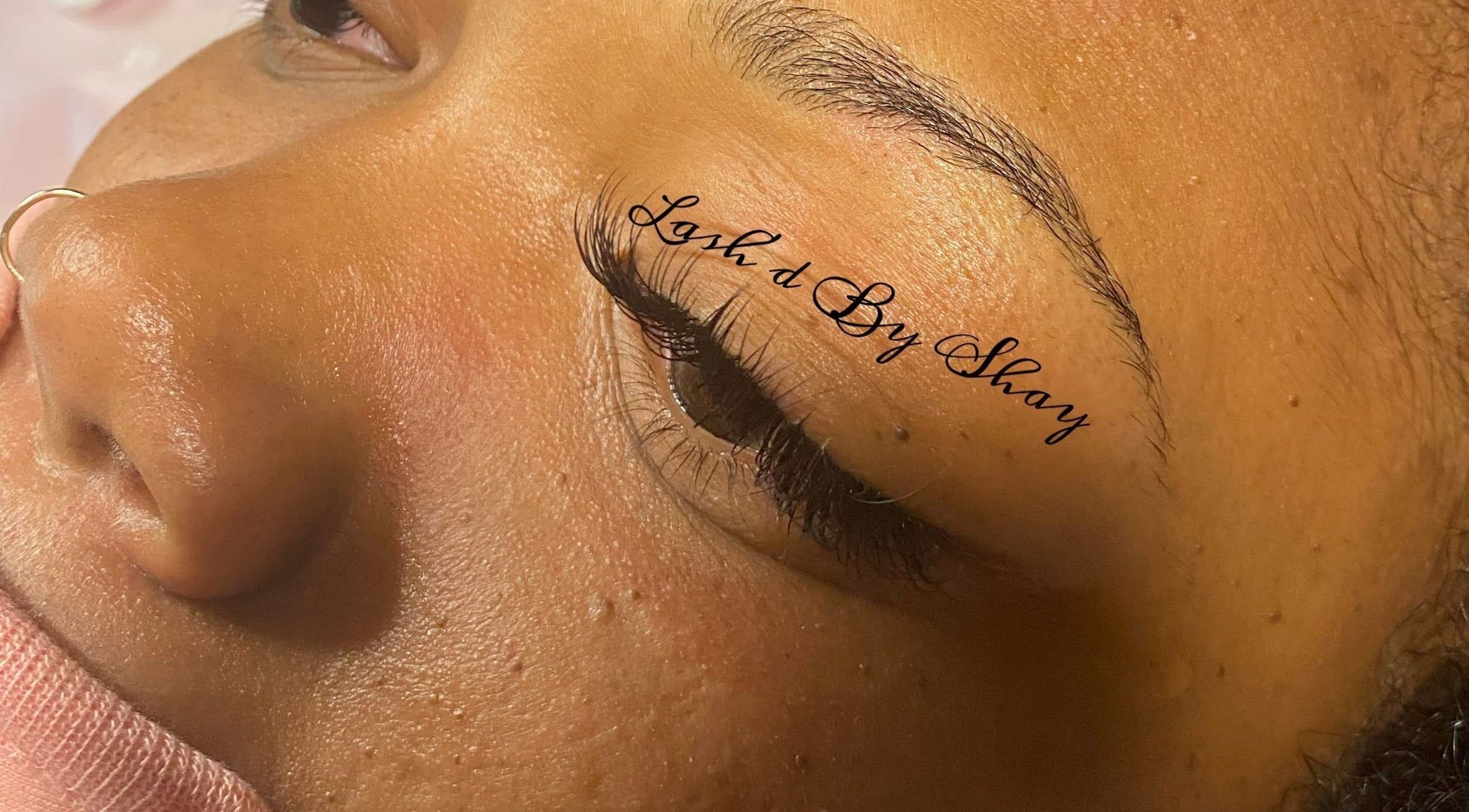 Close-up of expertly applied lashes at Lash'd by Shay Professional Lash Services, Lithonia, Georgia, US.