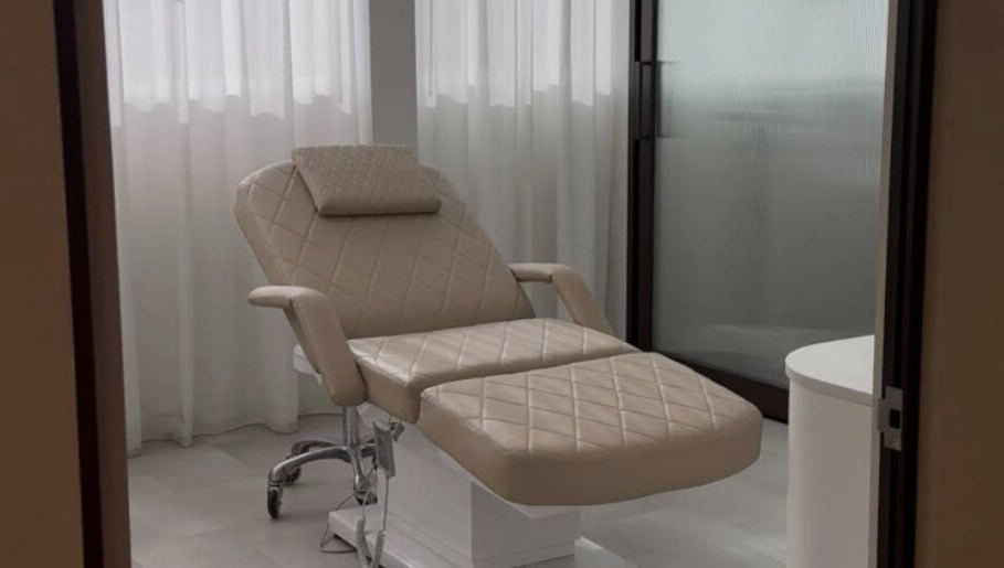 Luxurious treatment chair at EMBER Aesthetics, Mosman, New South Wales, AU, highlighting comfort and elegance.