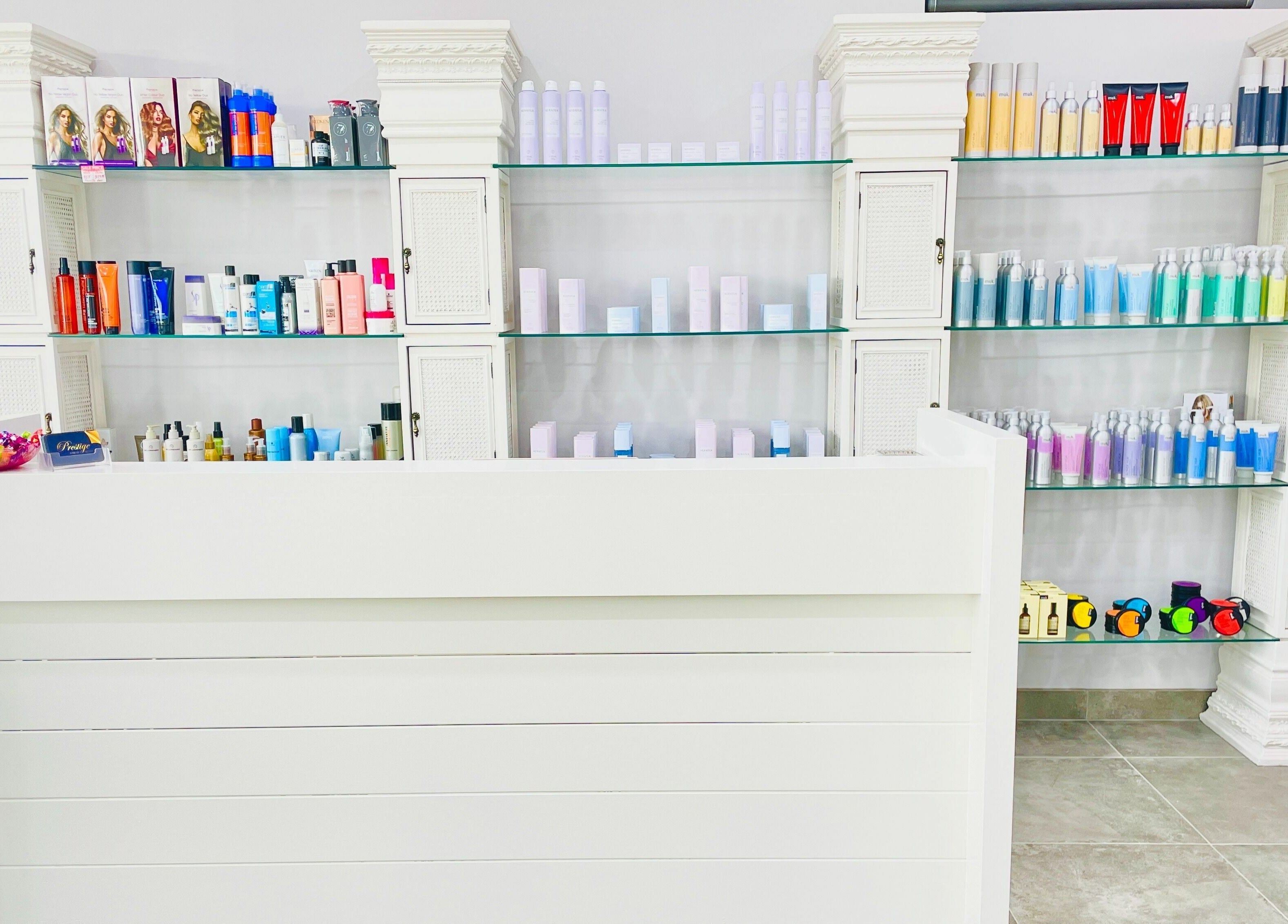 Sleek product display at Prestige Hair by Selma, Melbourne, Victoria, AU, featuring diverse hair care products.