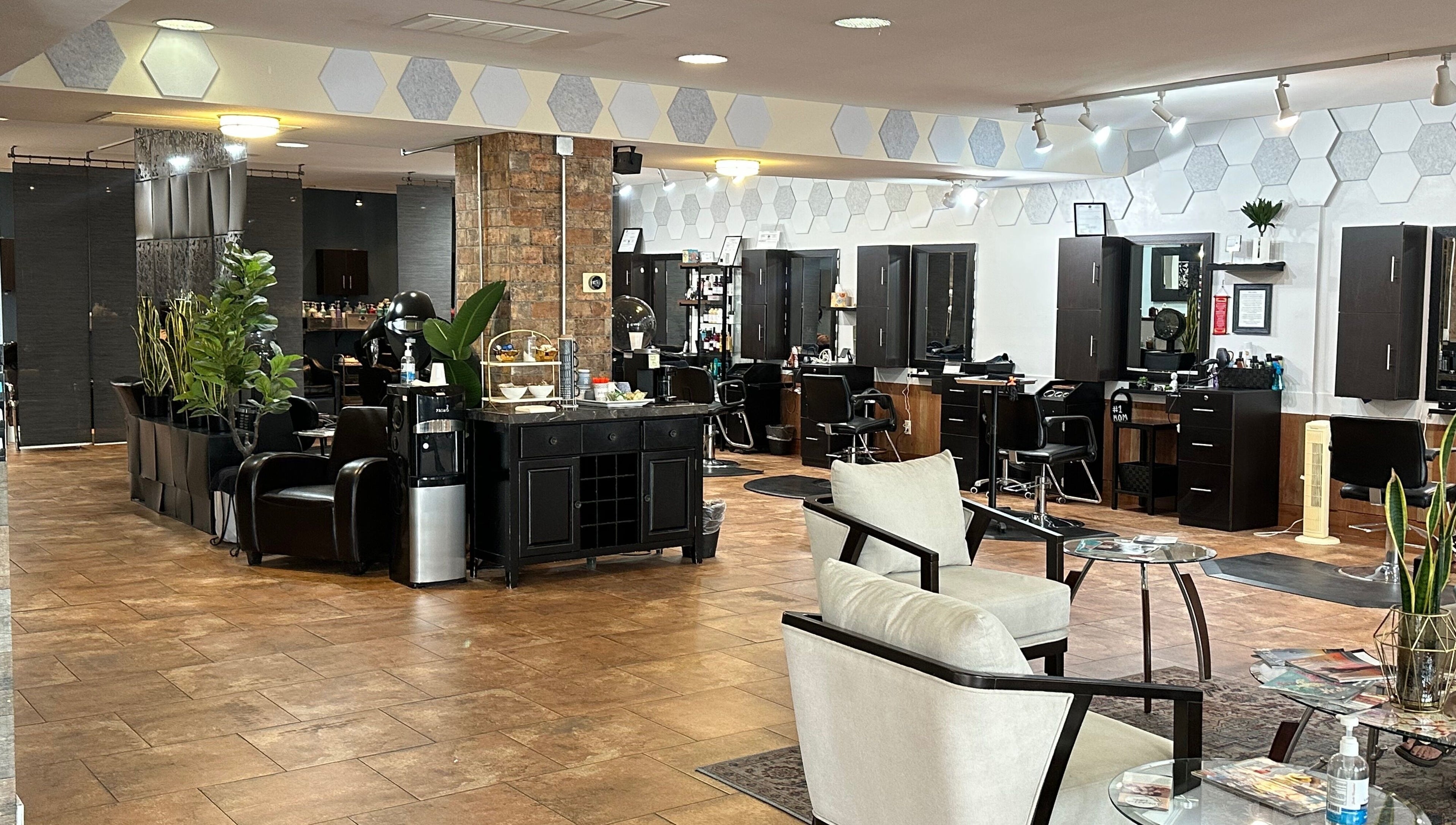 Spacious interior of Refreshed Looks Aesthetics in Tucson, Arizona, US, showcasing modern salon design and seating.