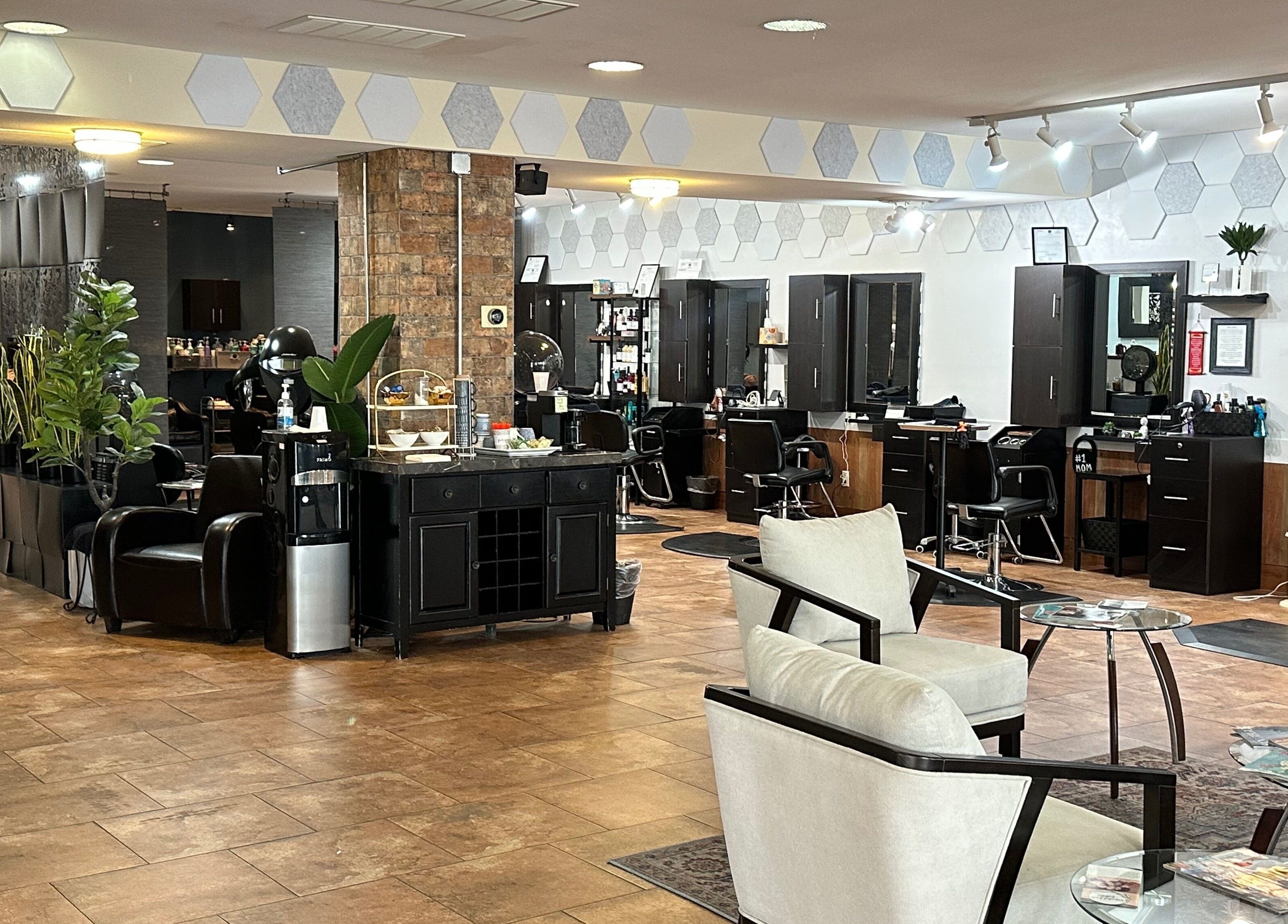 Spacious interior of Refreshed Looks Aesthetics in Tucson, Arizona, US, showcasing modern salon design and seating.