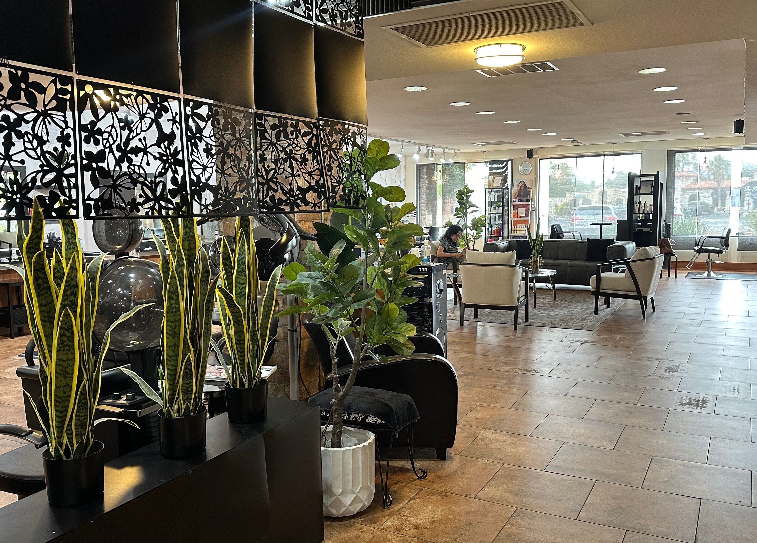 Elegant interior of Refreshed Looks Aesthetics in Tucson, Arizona, US, featuring modern decor and seating.