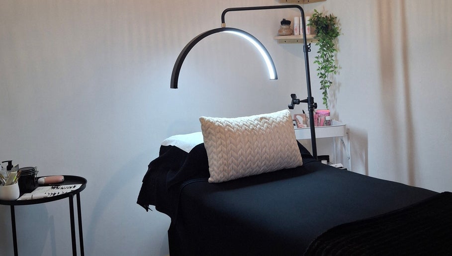 Cozy lash treatment bed at Lily's Lashes in Gillitts, Kwazulu-Natal, ZA with ambient lighting.