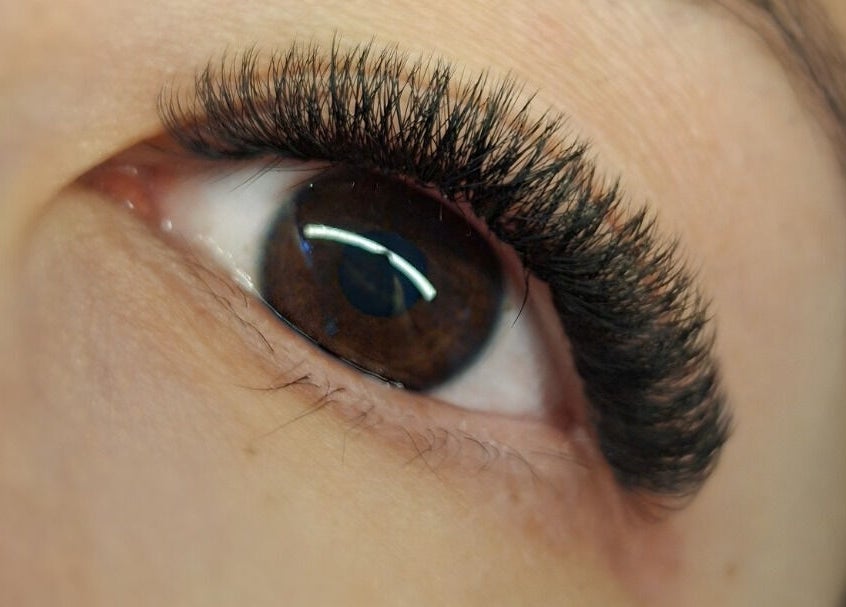Close-up of eyelash extensions at Lily's Lashes, Gillitts, Kwazulu-natal, ZA showcasing expert craftsmanship.
