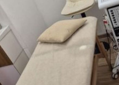 Massage room at Daily Therapy Spa (In-Home Massage), Dubai, Dubai, AE with treatment bed and equipment.