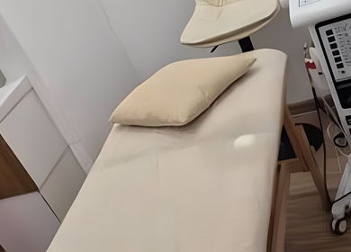 Cozy massage bed at Daily Therapy Spa (In-Home Massage), Dubai, Dubai, AE, offering serene relaxation.