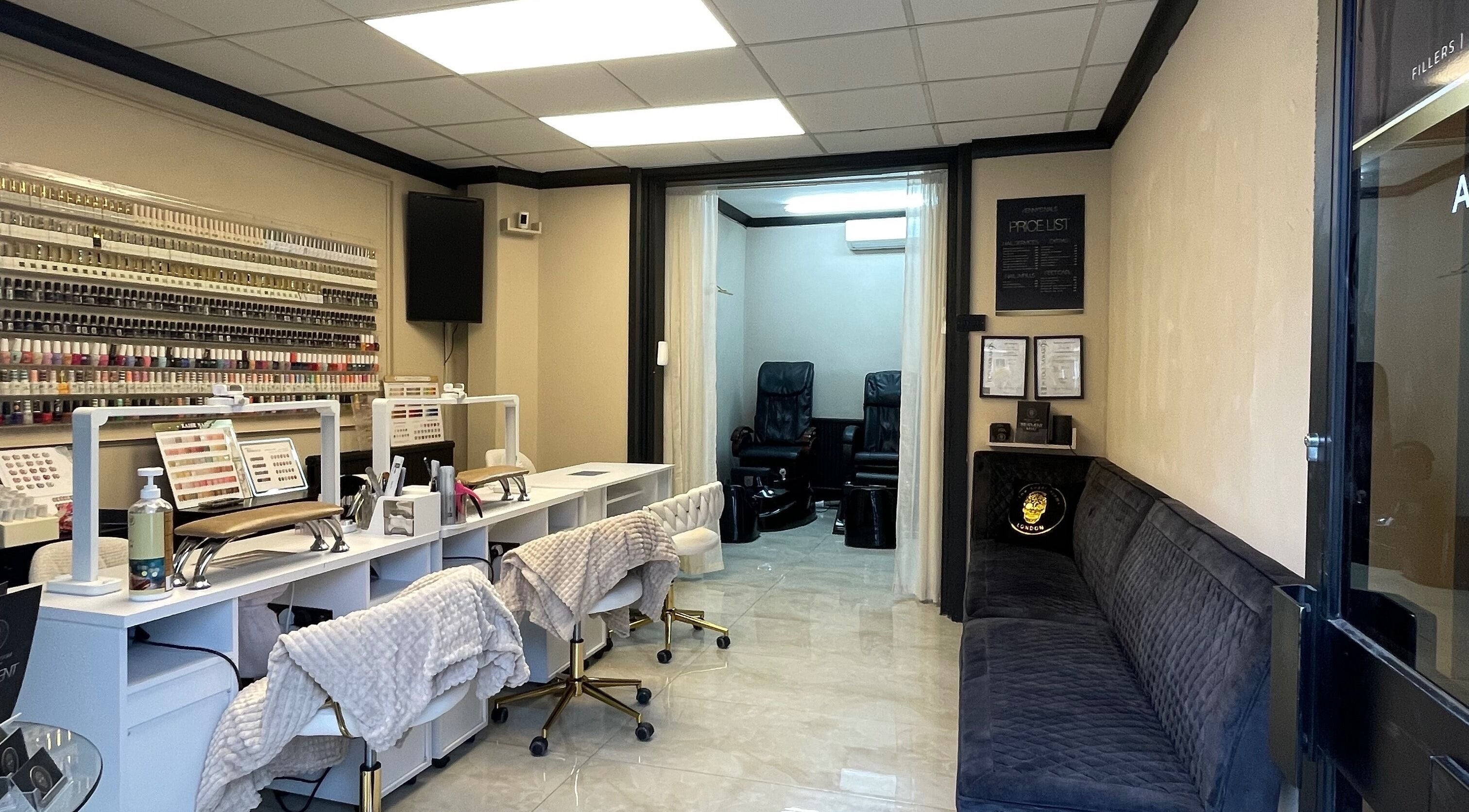 Interior of Mannor Park Nails in London, England, GB, showcasing manicure stations and seating area.