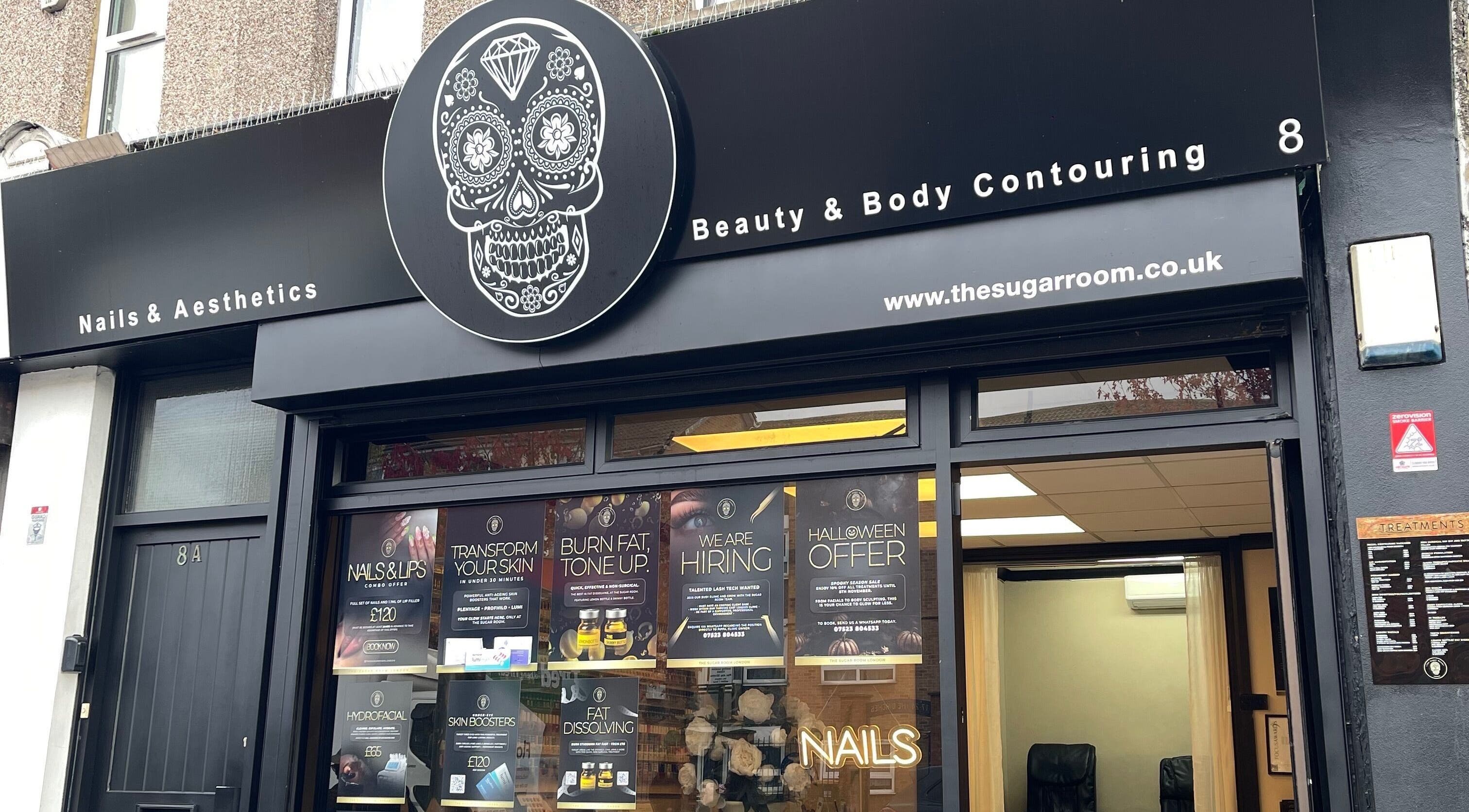 Front of Mannor Park Nails in London, England, GB featuring modern signage and inviting entrance.