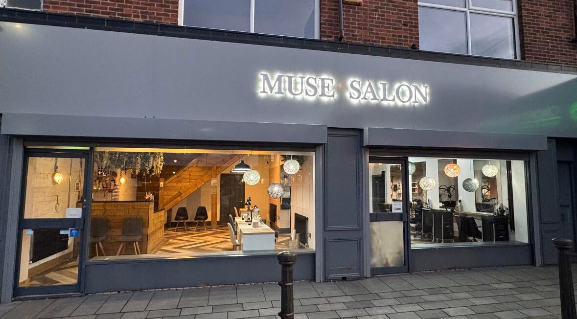 Modern salon exterior of Hair by Demi in Blyth, England, GB, showcasing stylish design and large windows.