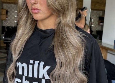 Blonde hair styled at Hair by Demi in Blyth, England, GB. Modern salon interior enhances client experience.