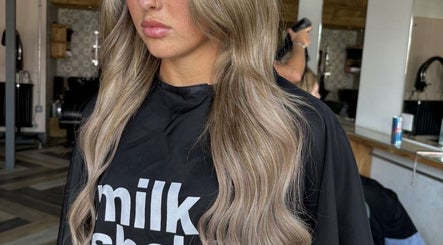Blonde hair styled at Hair by Demi in Blyth, England, GB. Modern salon interior enhances client experience.