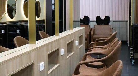 Luxurious seating at W Hair Lounge, Hurstville, New South Wales, AU. Mirrors and chairs create a serene ambiance.