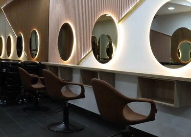 Elegant salon mirrors and chairs at W Hair Lounge, Hurstville, New South Wales, AU.