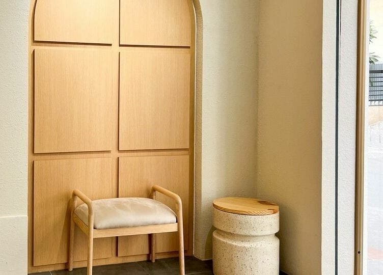 Minimalist seating area at Gemini Japanese Hair Salon in Hồ Chí Minh, Hồ Chí Minh, VN. Elegant and inviting ambiance.