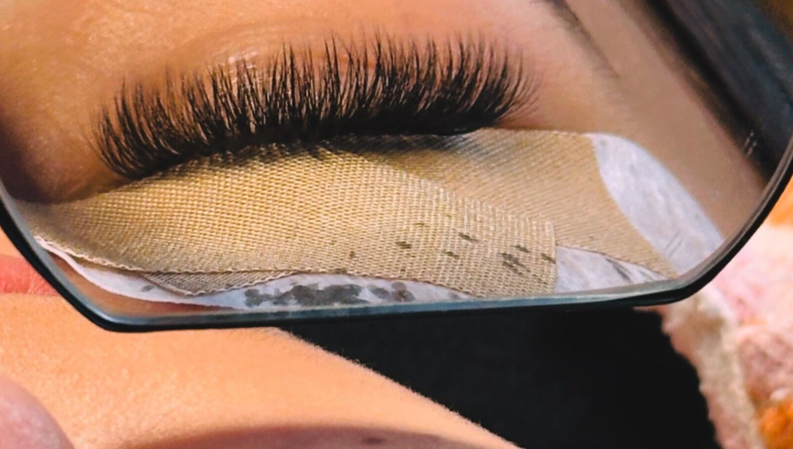 Close-up of eyelash extensions reflected in a mirror at Thelashlounge, Cape Town, Western Cape, ZA.