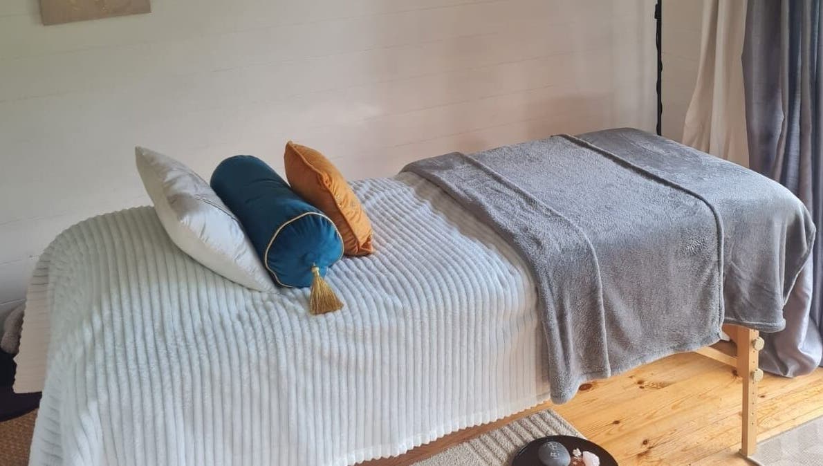 Elegant massage table at The Healing Room, Dublin, Dublin, IE, invites relaxation and wellness.